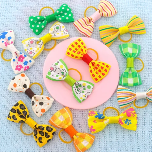 Vista 7 de QingHan Lazos para el pelo de cachorro: 5 cm con bandas de goma, accesorios pequeños para el aseo de mascotas para niñas, 100 piezas (50 pares)