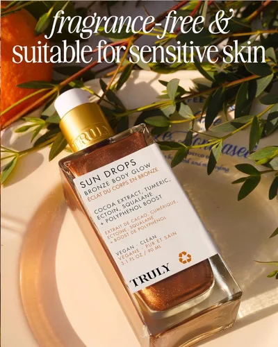 Vista 3 de Truly Sun Drops - Aceite de bronce para brillo corporal – Aceite bronceador para piel radiante, brillo corporal hidratante con cúrcuma y extracto