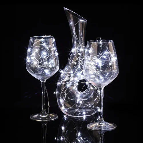 Vista 3 de Paquete de 24 luces de hadas que funcionan con pilas, 3.3 pies, 20 luces LED blancas frías, tira de luces LED impermeables para bodas, fiestas