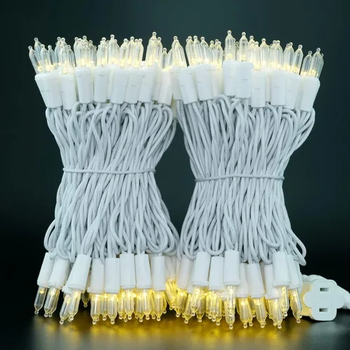 Vista 8 de YULETIME Juego de 200 luces LED de Navidad de color blanco cálido, cable blanco de 66 pies, certificado UL, grado comercial, juego de luces navideñas