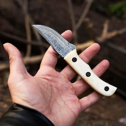 Vista 5 de YA FORGE- 7" Hand-Forged Damascus Steel Hunting knife, Majestic Camel Bone Handle, Unyielding 3" Fixed Blade, The Ultimate Survivalist’s Bowie Knife