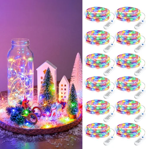Vista 15 de Minetom Paquete de 20 luces de hadas que funcionan con pilas, 8 modos y temporizador, 7 pies, 20 LED, 6 colores, impermeable, alambre plateado