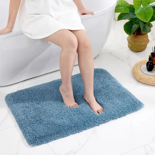 Disolla - Alfombra antideslizante y esponjosa para el suelo del baño, lavable, afelpada, para lavabo y ducha, absorbente, color azul, 24 x 36