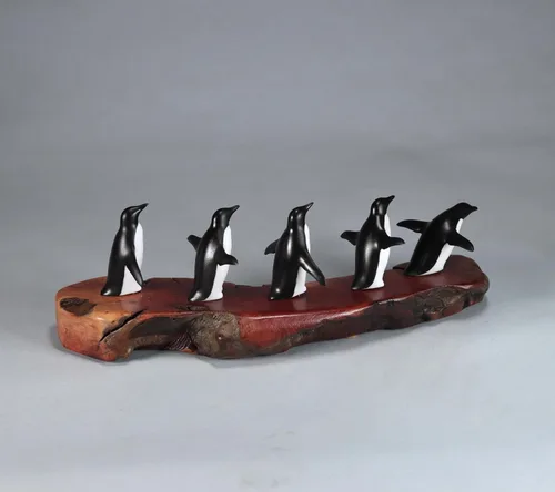 Vista 8 de Penguin Flock of 5 Sculpture by John Perry11 inches Long on Polished burlwood Base. Signed.
