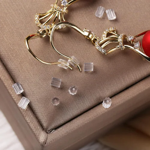 Vista 5 de Respaldos de Aretes de Goma Suaves y Transparentes para Pendientes de Botón Respaldos de Aretes de Silicona Hipoalergénicos Topes de Repuesto