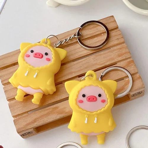 Vista 6 de Funda para Air Tag, linda cubierta de silicona de cerdito de dibujos animados para AirTags Location Tracker, Impermeable Piggy