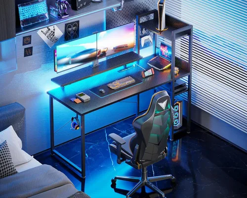 Vista 2 de ODK Escritorio reversible para juegos con tomas de corriente y luces LED, escritorio para computadora de 48 pulgadas con estantes de almacenamiento