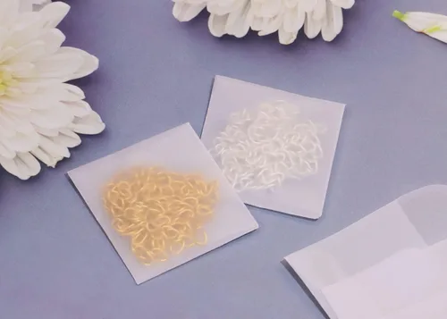 Vista 4 de ONLYKXY 60 bolsas de papel translúcido blanco para sobres, mini bolsas de papel de mantequilla, bolsa pequeña de regalo para joyería, anillo