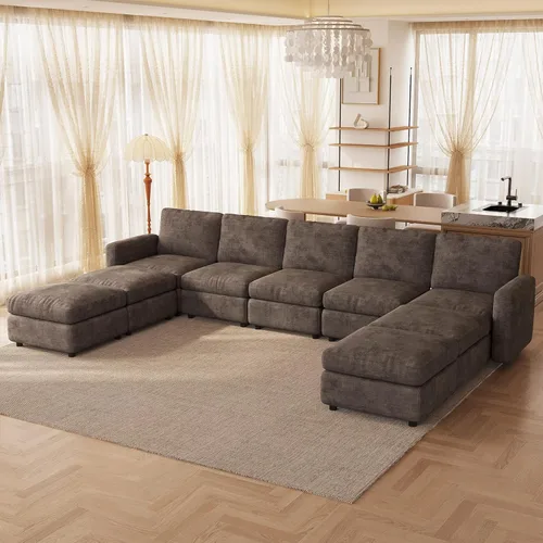 Vista 129 de Guyii Sofá modular de terciopelo, moderno sofá de 4 plazas de gran tamaño con 3 almohadas y reposapiés de almacenamiento, sofá convertible de 115.74