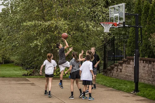 Vista 16 de Silverback Height Adjustable In-Ground Basketball Hoop with Tempered Glass Backboard, Pro-Style Breakaway Rim & Backboard Pad