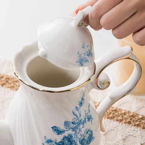 Vista 5 de Tetera de cerámica Agyiuns, tetera de porcelana con tapa, 38.8 Oz para té, leche, café, té de flores (Azul)