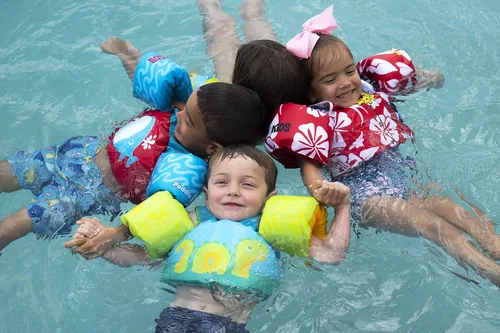 Vista 11 de Body Glove Paddle Pals - Chaleco salvavidas para niños aprobado por la Guardia Costera para aprender a nadar PFD