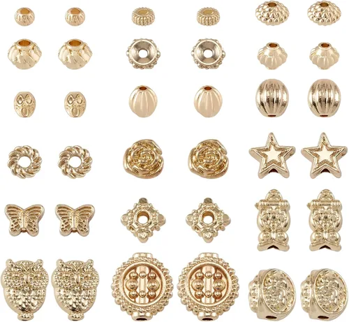 Craftdady 180 cuentas espaciadoras de aleación, cuentas occidentales, cuentas tibetanas de oro claro, surtidas, cuentas de estrella Rondelle,
